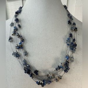 Multi strand infinity style necklace with lapis chip beads